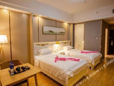 Yue Hai Li Jing Jiu Dian Shao Xing Yin Tai Bai Huo Dian