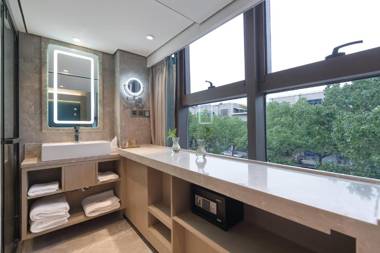 Mengguo Hotel Zhuqiao Town