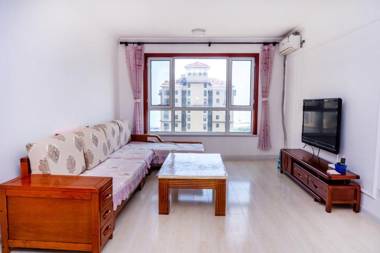 青岛金沙滩全家幸福三居室四床公寓Golden Beach Happiness Holiday Apartment