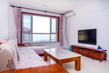 青岛金沙滩全家幸福三居室四床公寓Golden Beach Happiness Holiday Apartment