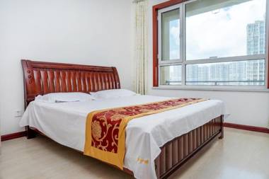 青岛金沙滩全家幸福三居室四床公寓Golden Beach Happiness Holiday Apartment