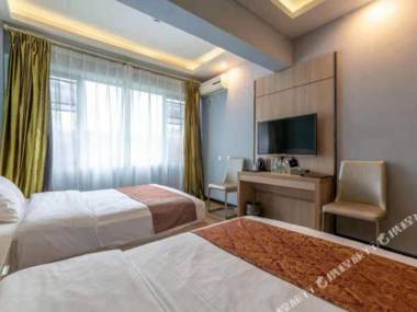 Dhenggong Yuchengjia Express Hotel