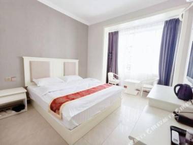 Kun Ming Qi Cai Hotel