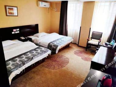 Kun Ming Jin Luo Wan Shang Wu Hotel