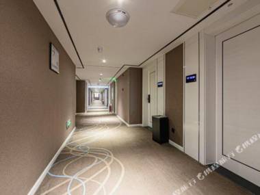 Xana Hotelle(Jinan Zhangqiu railway station Taiwan never Night City store)