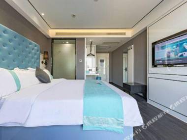 Xana Hotelle(Jinan Zhangqiu railway station Taiwan never Night City store)