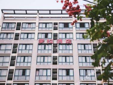 Luola Fengqing Holiday Hotel (Hangzhou Xiasha Xueyuan Street)
