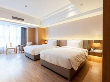 Charm City Kai Guan Hotel (Chengdu West Railway Station Qingyang Wanda)