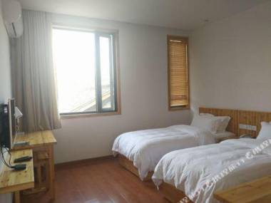 Wangshan Gongshe Featured Hotel