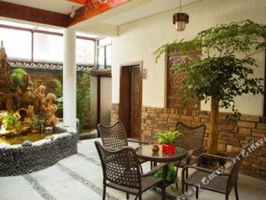 Da Li Qi Cai Yun Duo Inn