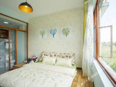 Da Li Qi Cai Yun Duo Inn