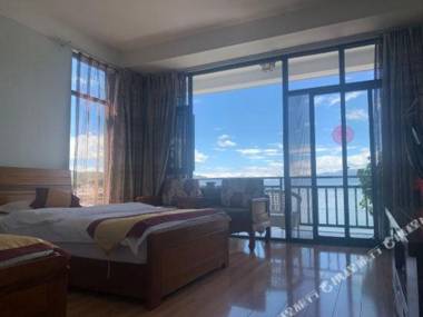 Da Li Shuang Lang Sha Niu Ban Dao Quan Jing Inn