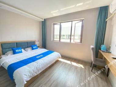 Yuezhijia Business Hotel (Huoshan Ferris Wheel Passenger Transport Center)