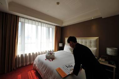 Wealthy All Suite Hotel Suzhou