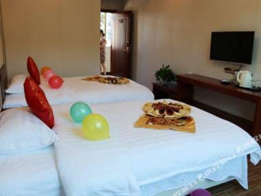 Towo Holiday Hotel (Manchuanguan Ancient Town Shop in Shanyang)