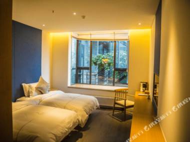 Xichang Shuxia Hotel