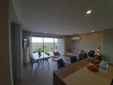 La Boquilla 4 personas frente a la playa