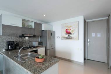 Relaxing 1 BR Beachfront Apartment w Wifi and Pool