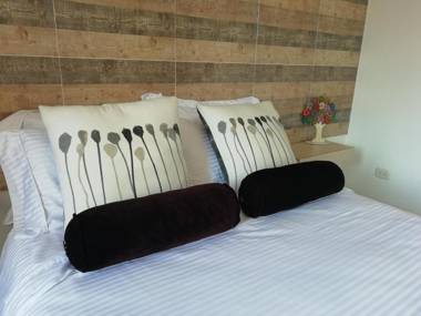 Apartasuite Laureles CMC