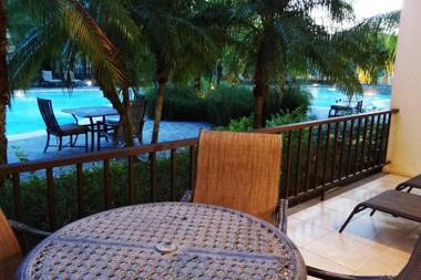 Ground-floor unit in front of lazy river pool at Pacifico in Coco