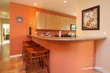 Luxe! Impressively designed 2nd-floor unit in Coco done in red and orange hues