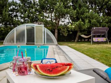 Comfortable apartment with covered pool and fenced garden