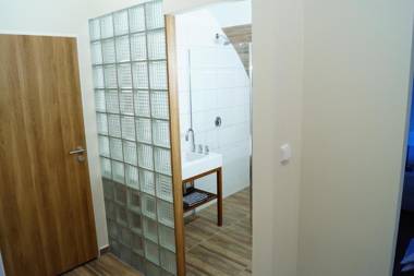 Apartmány u komína