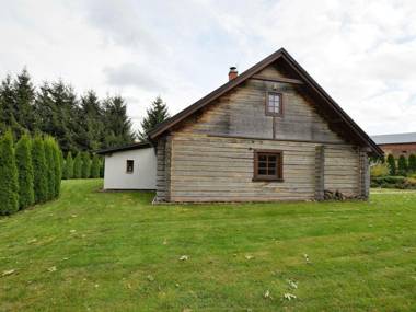 Detached log house with large fenced garden covered terrace
