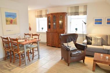 Neuerbautes Haus im Friesenstil. Moderne 2-Zimmer-Appartements mit Balkon für bis zu 4 Personen