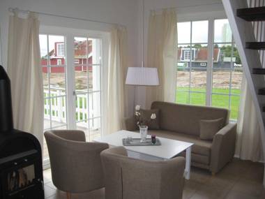 Modern detached bungalow with a fireplace on the Baltic Sea