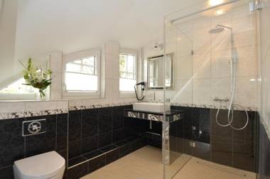 Kapitäns Hus - Haushälfte 2 mit Kamin Sauna Wasserblick