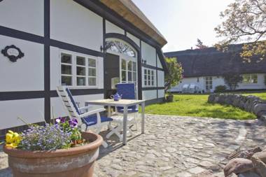 Gutshof Ostseeblick Ferienwohnungen FeWo 3 Terrasse Gartennutzung