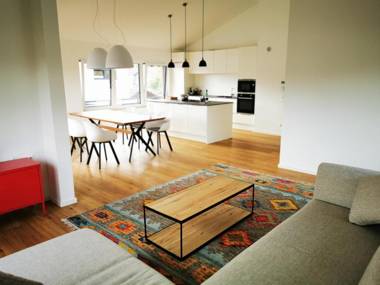 Chalethaus-Chiemsee - 120qm Panorama-Chaletwohnung am Chiemsee - Neubau