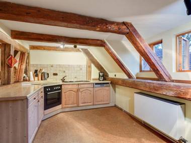 Historic half-timbered farmhouse in the Lüneburg Heath with wood stove