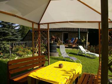 Spacious holiday apartment with its own garden