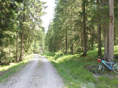 Holiday home in the Allgäu featuring a tiled stove and a private terrace with mountain views.