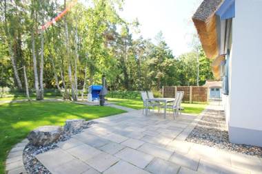 Ferienhaus Stranddistel Haus Terrasse Garten eigene Sauna