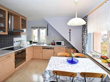 Lovely holiday home in the Thüringer Forest with balcony deckchairs and barbecue area