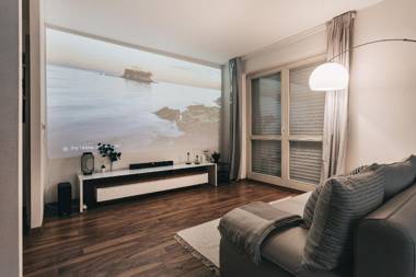 Modernes Apartment mit Heimkino Netflix und Bike