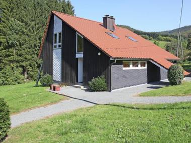 Rustic holiday home in the Hochsauerland with balcony at the edge of the forest