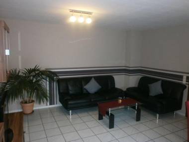 Modern holiday apartment with large garden 500 m away from the river Moselle