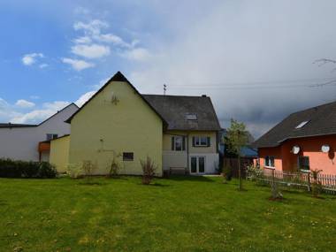 Comfortable house with a large fenced garden in beautiful Hünruck