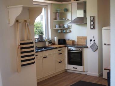 Ferienwohnung Alte Fehnapotheke 95144