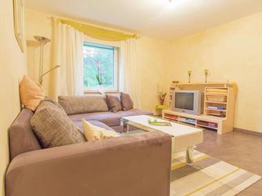 Apartment in Waxweiler with Sauna Terrace Garden BBQ