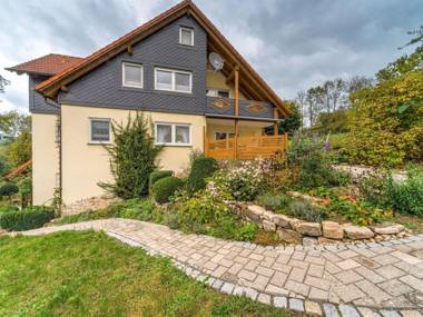 Cosy holiday home at the edge of town with a balcony and large garden