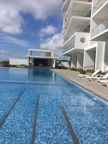 Departamentos frente al mar en Resort Playa Azul-Tonsupa