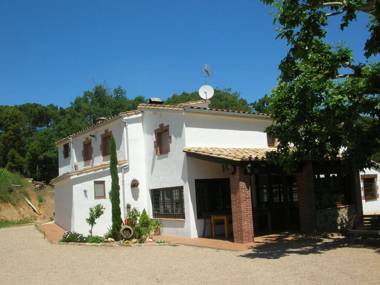 A farmhouse with a private swimming pool in the Costa Brava.