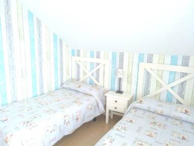 2 bedrooms house with shared pool enclosed garden and wifi at Suances 5 km away from the beach