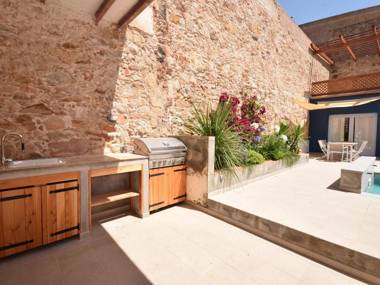 Beautiful authentic house with large patio and swimming pool near the beach