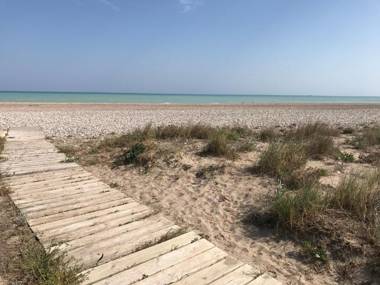 Adosado en primera línea con piscina privada